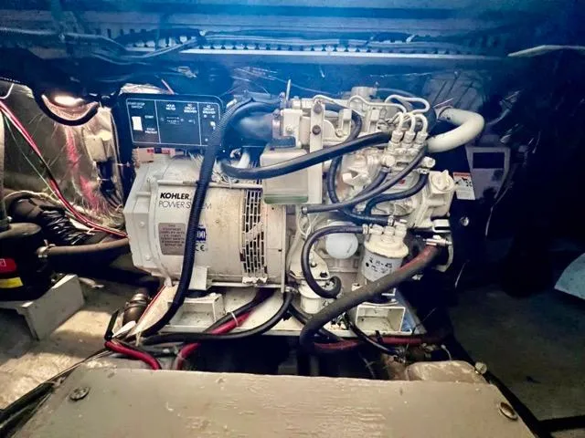 Slide: The Image of Engine room of a 1998 Carver 405 Motor Yacht with Kohler generator. - 32