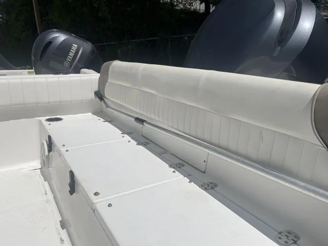 Slide: The Image of 2012 Sea Hunt 225 Victory W/A boat interior with Yamaha engine. - 4