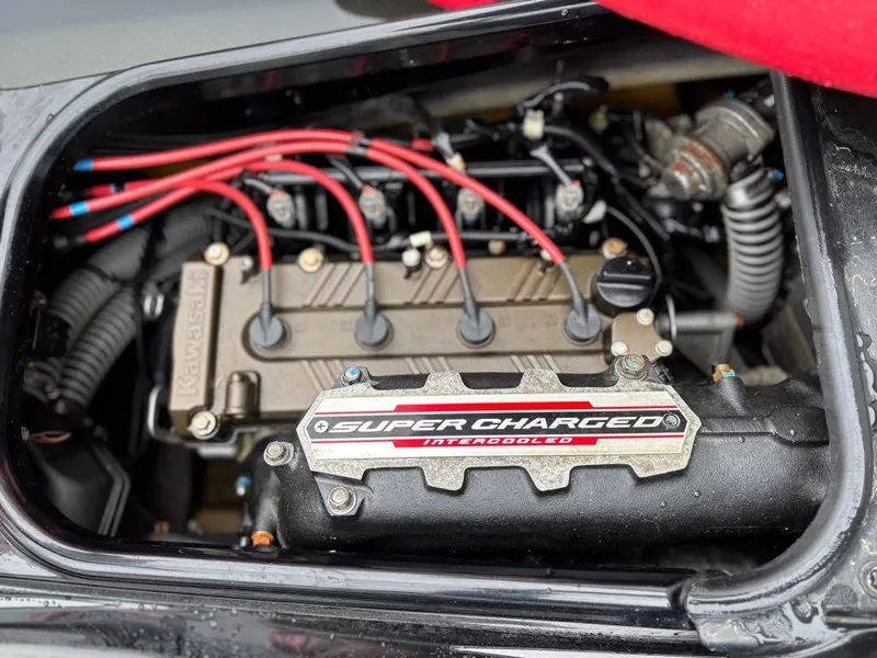 Slide: The Image of Supercharged engine of 2014 Kawasaki Jet Ski Ultra 310X, featuring red ignition wires. - 3