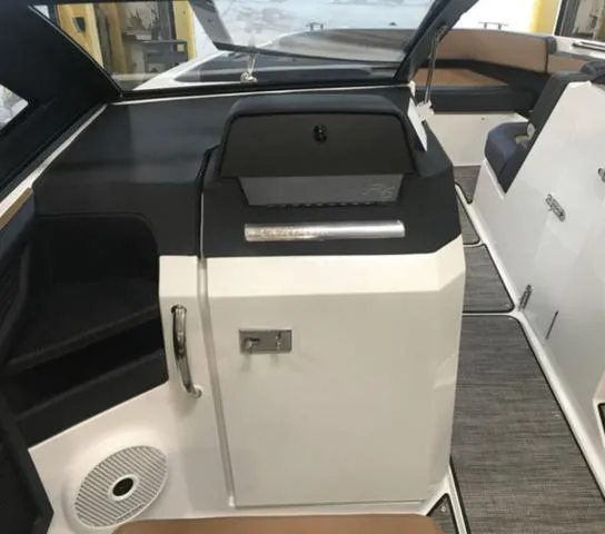 Slide: The Image of 2024 Cobalt R6 Surf boat interior with sleek design and modern amenities. - 10