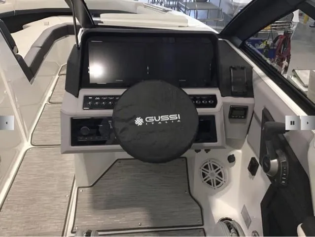 Slide: The Image of 2024 Cobalt R8 boat dashboard with Gussi Italia steering wheel cover. - 8