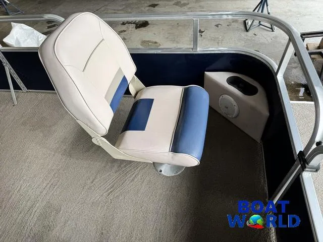 Slide: The Image of 2012 Weeres Cadet 200 Pontoon seat with blue and beige upholstery, Boat World logo visible. - 15
