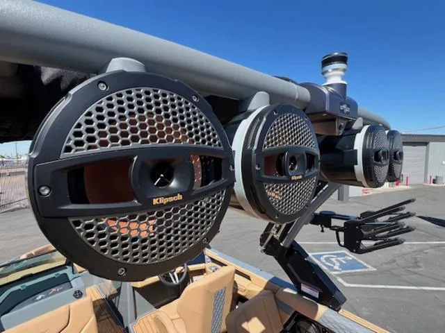 Slide: The Image of 2025 MasterCraft XT23 boat with Klipsch speakers, showcasing premium audio system. - 13