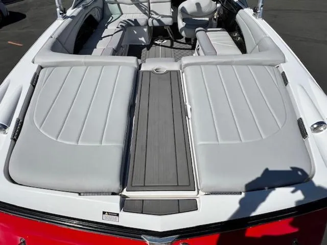 Slide: The Image of 2006 MasterCraft X30 boat interior with gray seating and sleek design. - 10