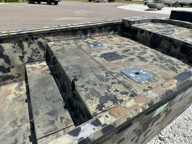 Slide: The Image of 2023 Thor Boats Lake Hammer Standard with camouflage design, featuring a rugged interior layout. - 6