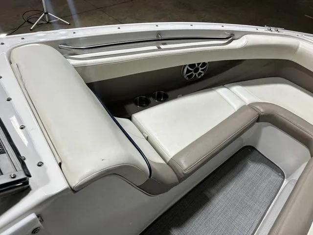 Slide: The Image of Interior of a 2003 Cobalt 226 boat with white and beige seating. - 7