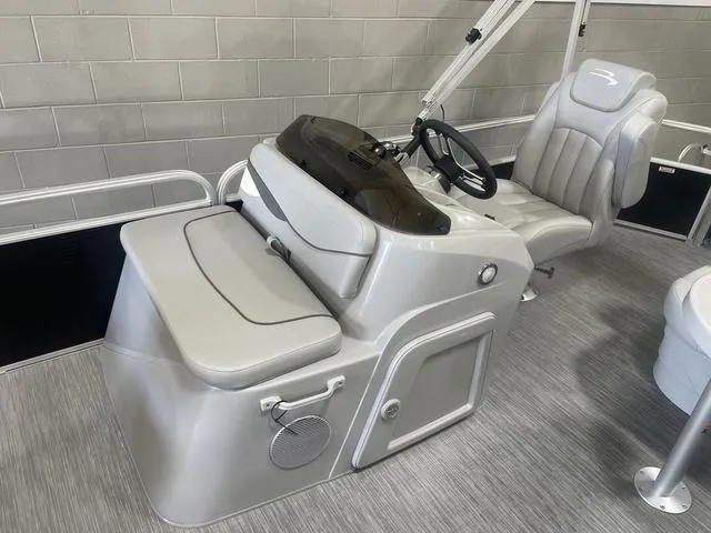 Slide: The Image of 2023 Bennington 20 SVF boat interior with sleek helm and comfortable seating. - 21