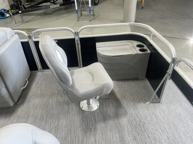 Slide: The Image of 2023 Bennington 20 SVF boat interior with gray seating and cup holders. - 26
