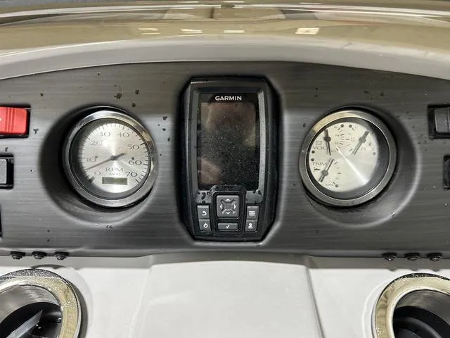 Slide: The Image of Dashboard of 2023 Bennington 24 SXL with Garmin display and gauges. - 14