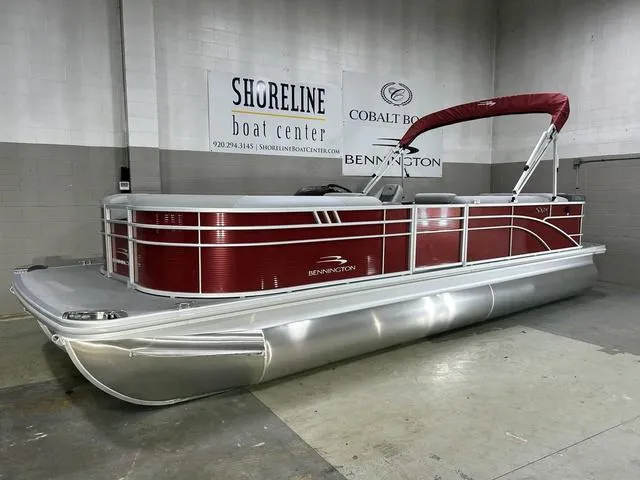 Slide: The Image of 2023 Bennington 24 SXL pontoon boat with red exterior at Shoreline Boat Center. - 3