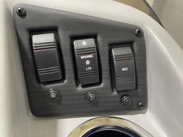 Slide: The Image of Control panel of 2023 Bennington 20 SVL boat with switches for navigation and accessories. - 15