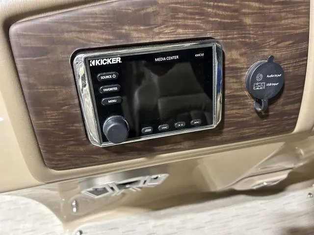 Slide: The Image of 2016 Bennington 2550 GSR boat dashboard with Kicker media center and audio input. - 11