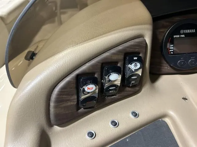 Slide: The Image of Control panel of a 2016 Bennington 2550 GSR boat with Yamaha speed gauge. - 12