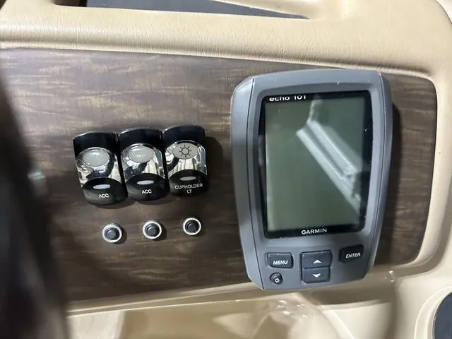 Slide: The Image of Control panel of a 2016 Bennington 2550 GSR with Garmin echo 101 device. - 13