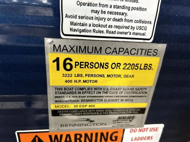 Slide: The Image of 2016 Bennington 2550 GSR capacity label: 16 persons or 2205 lbs, 400 HP motor. - 16