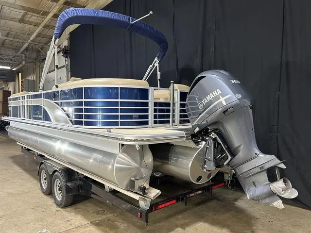 Slide: The Image of 2016 Bennington 2550 GSR pontoon boat with Yamaha outboard motor on trailer. - 4