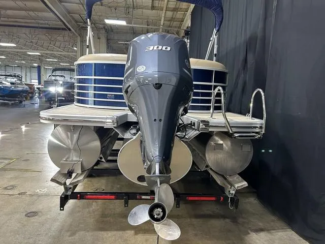 Slide: The Image of 2016 Bennington 2550 GSR pontoon boat with powerful 300 HP engine in a showroom. - 5