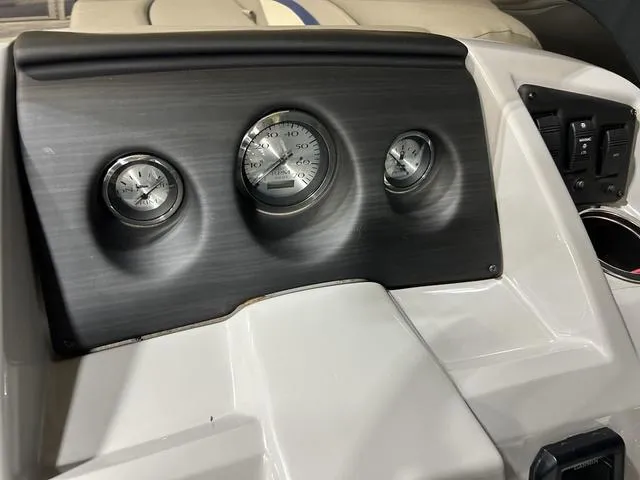 Slide: The Image of Dashboard of 2022 Bennington 22 SVSR boat with gauges and controls. - 14