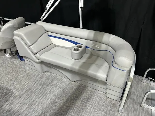 Slide: The Image of 2022 Bennington 22 SVSR boat seating with gray upholstery and cup holders. - 18