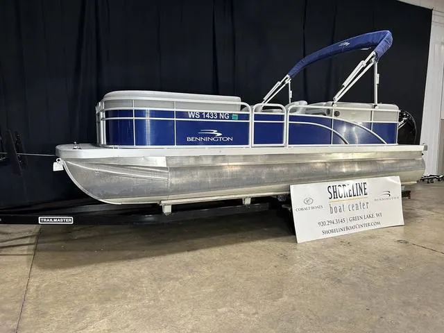 Slide: The Image of 2022 Bennington 22 SVSR pontoon boat displayed at Shoreline Boat Center. - 2