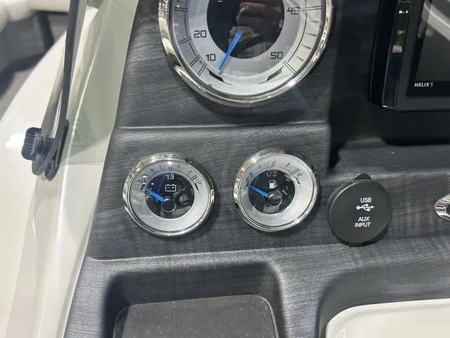 Slide: The Image of Dashboard of 2018 Sylvan 8522 Party Fish boat with gauges and USB input. - 14