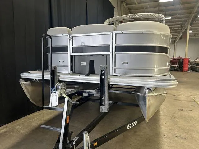 Slide: The Image of 2018 Sylvan 8522 Party Fish pontoon boat on trailer in warehouse. - 4