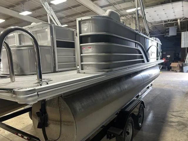 Slide: The Image of 2018 Sylvan 8522 Party Fish pontoon boat in a warehouse setting. - 6
