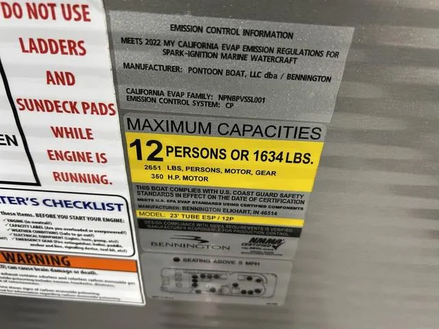 Slide: The Image of 2022 Bennington 24 LXSB capacity label: 12 persons or 1634 lbs, 350 HP motor. - 10