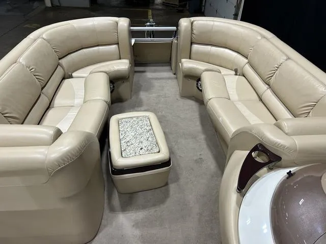 Slide: The Image of Luxurious interior of 2007 Bennington 2275 QXI pontoon boat with beige seating. - 20