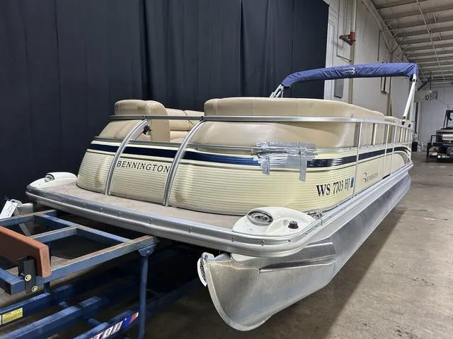 Slide: The Image of 2007 Bennington 2275 QXI pontoon boat in indoor storage facility. - 3