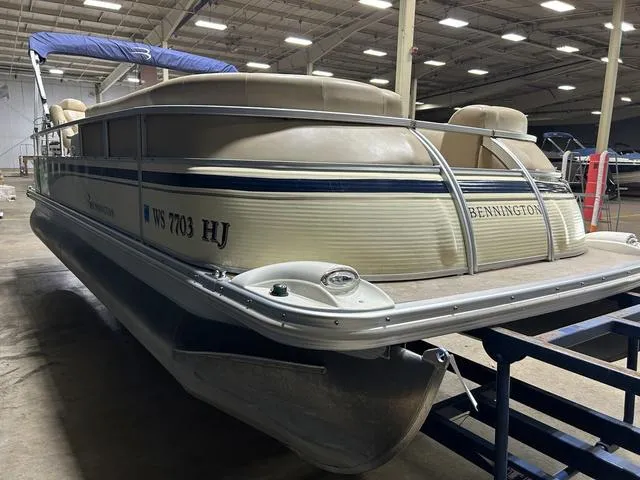 Slide: The Image of 2007 Bennington 2275 QXI pontoon boat in indoor storage facility. - 9