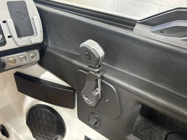 Slide: The Image of 2024 Malibu 23 LSV interior detail showing control panel and sleek design elements. - 18