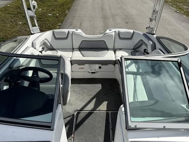 Slide: The Image of 2017 Yamaha Boats AR190 interior with seating and steering wheel, viewed from above. - 10