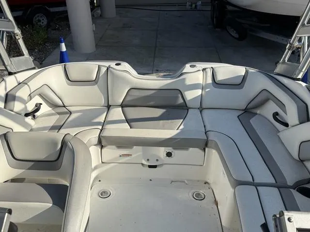 Slide: The Image of 2017 Yamaha AR190 boat interior with cushioned seating and sleek design. - 15