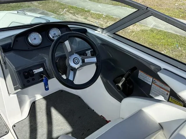 Slide: The Image of 2017 Yamaha Boats AR190 cockpit with steering wheel and dashboard gauges. - 6