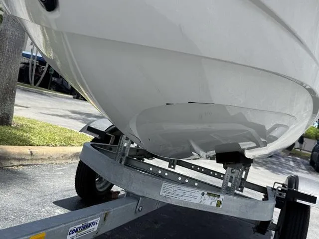 Slide: The Image of 2022 Yamaha WaveRunner VX Cruiser on a trailer, parked outdoors. - 6