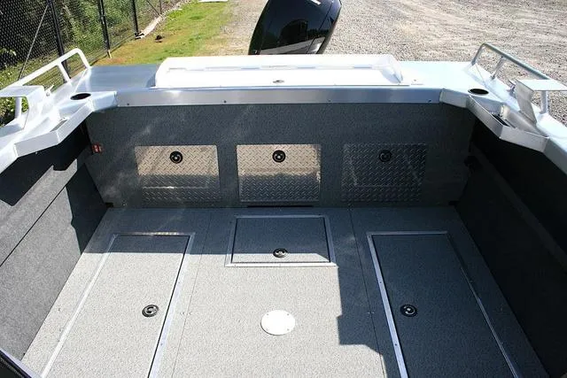 Slide: The Image of 2025 Thunder Jet 200 Luxor boat interior with spacious deck and storage compartments. - 10