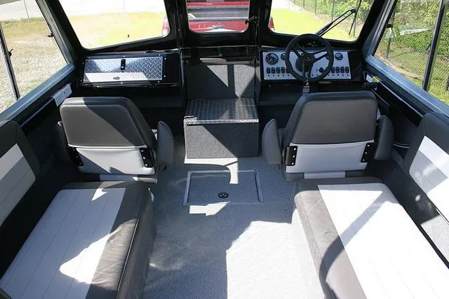 Slide: The Image of Interior of 2025 Thunder Jet 200 Luxor boat with seating and control panel. - 5