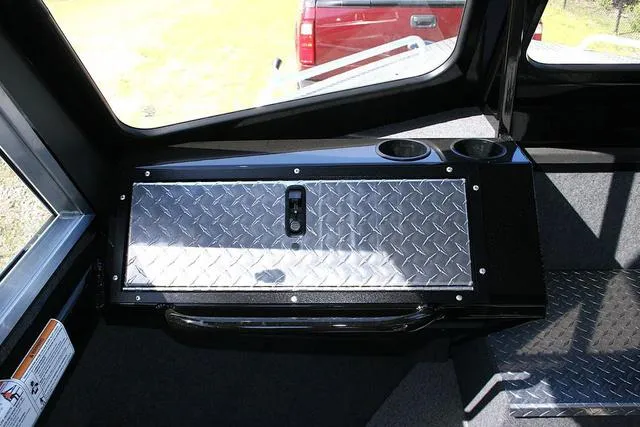 Slide: The Image of Interior of 2025 Thunder Jet 200 Luxor boat with diamond plate storage compartment. - 9