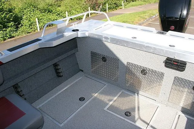 Slide: The Image of Interior of 2021 Thunder Jet 185 Luxor boat with storage compartments and seating. - 11