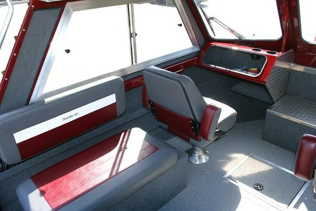 Slide: The Image of Interior of 2021 Thunder Jet 185 Luxor boat with red and gray seating. - 7