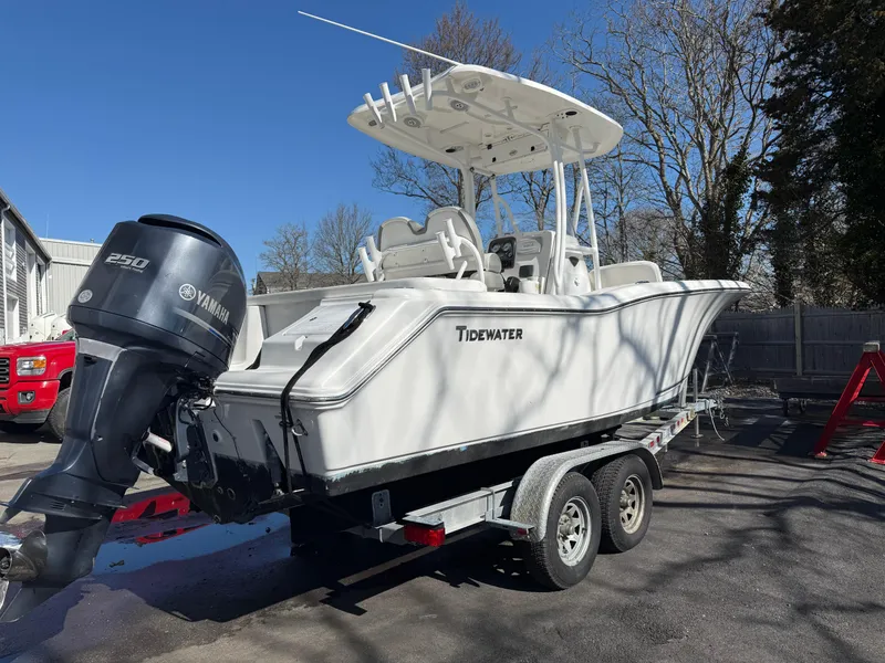 Slide: The Image of 2015 Tidewater 230 LXF boat on trailer with Yamaha outboard motor. - 3