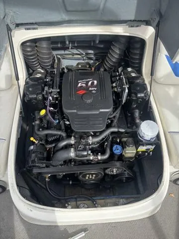 Slide: The Image of 2006 Bayliner 205 MX engine compartment with MerCruiser 5.0 MPI motor. - 10