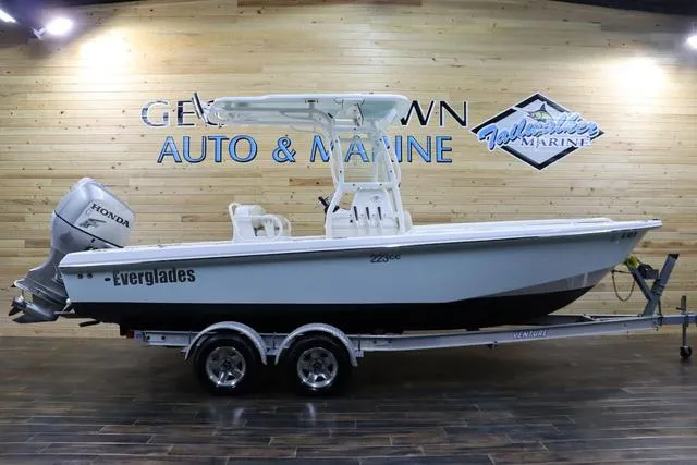 Slide: The Image of 2007 Everglades 223CC boat on trailer, displayed indoors at Georgetown Auto & Marine. - 1