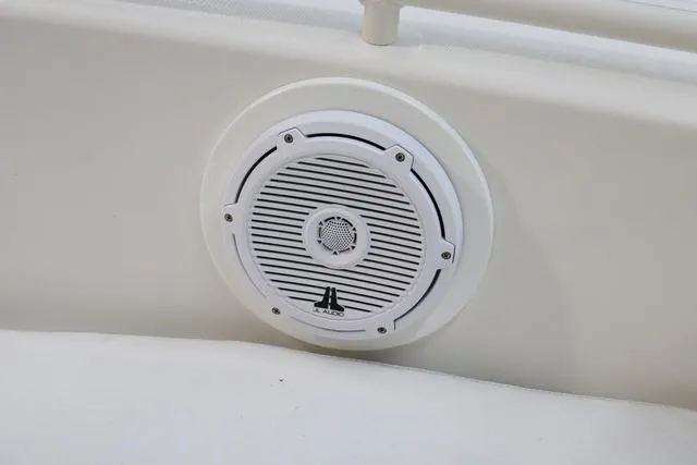 Slide: The Image of White JL Audio speaker on 2007 Everglades 223CC boat interior. - 24