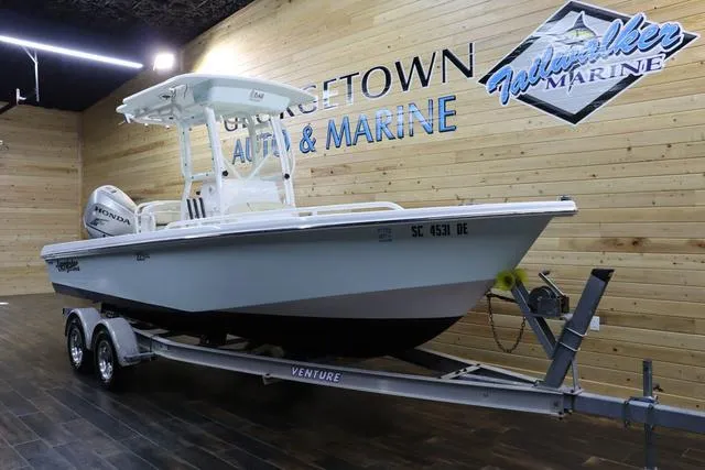 Slide: The Image of 2007 Everglades 223CC boat on trailer at dealership showroom. - 4