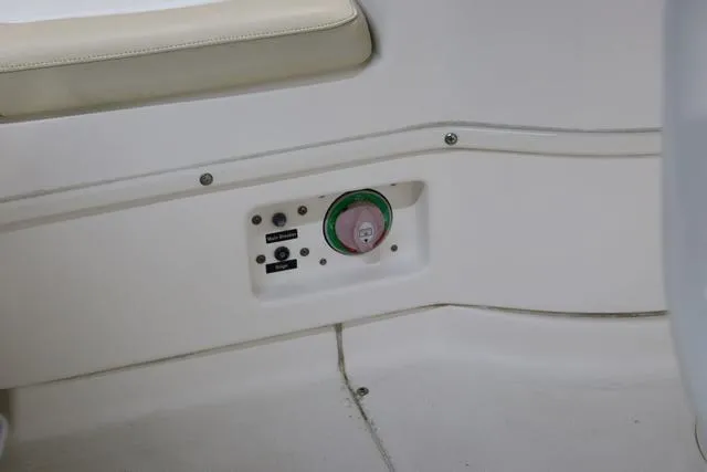 Slide: The Image of Control panel on a 2007 Everglades 223CC boat interior. - 8