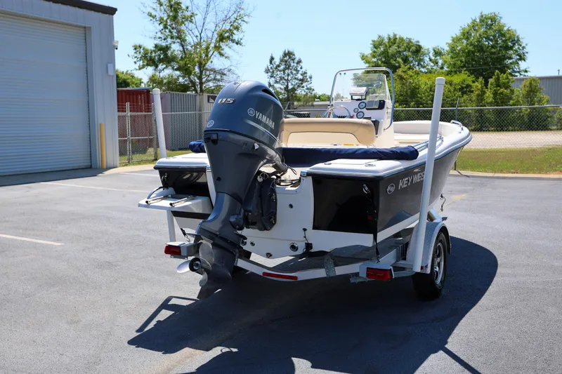 Slide: The Image of 2016 Key West 176 Center Console boat with Yamaha motor on trailer. - 1