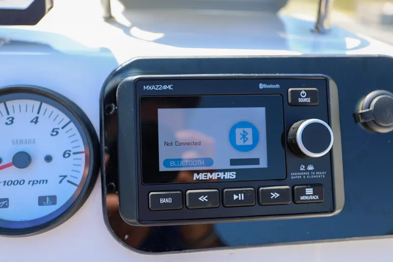 Slide: The Image of Dashboard of 2016 Key West 176 Center Console with Memphis Bluetooth stereo system. - 10