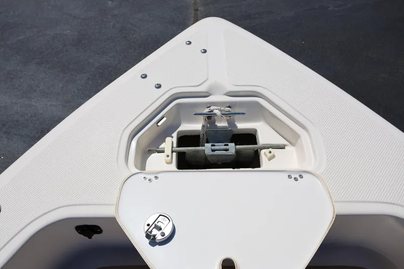 Slide: The Image of Bow anchor compartment of 2016 Key West 176 Center Console boat. - 18